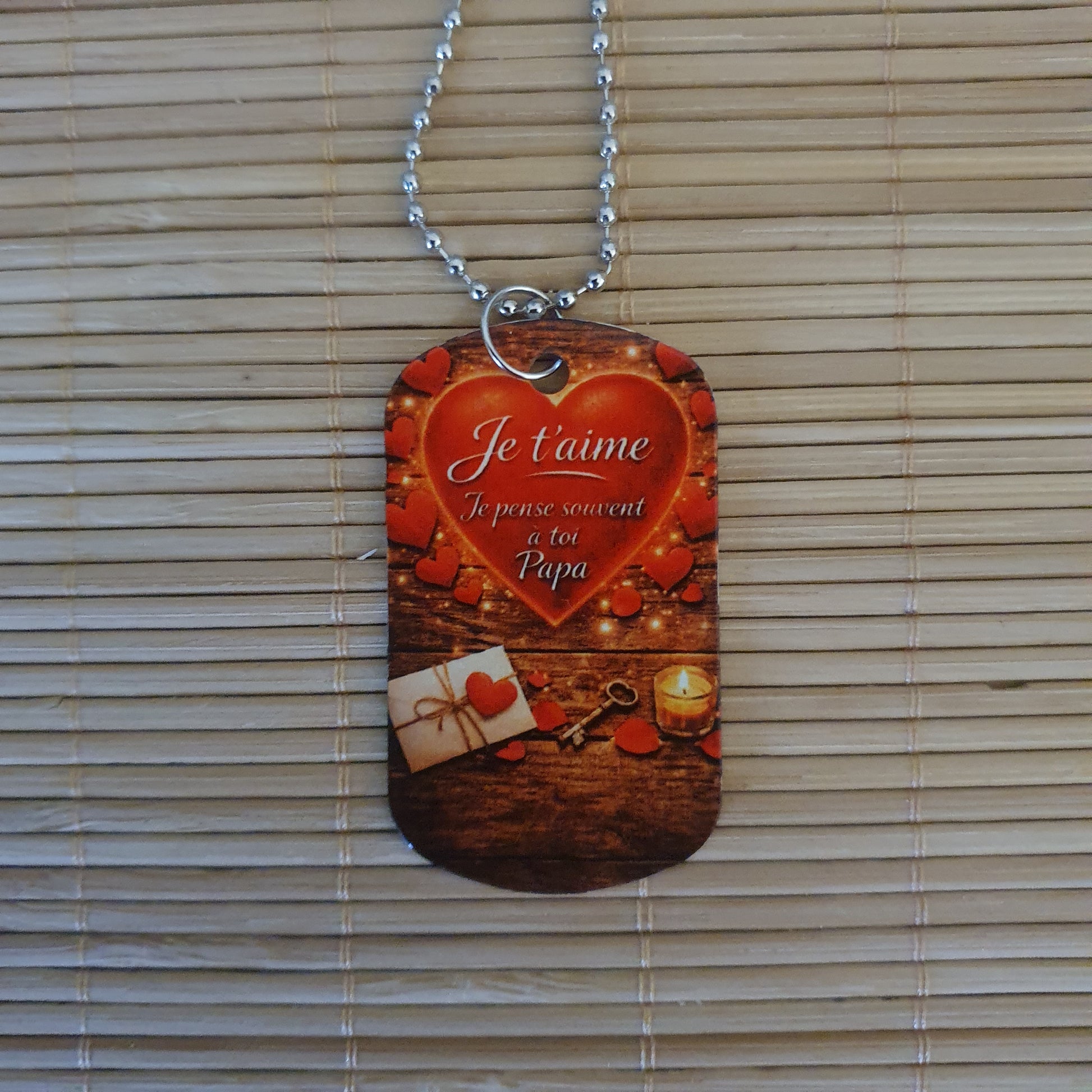 Dos de la plaque militaire avec message Je t'aime Papa et motif coeur